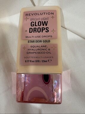 Revolution Bright Light Glow Drops - Gold with Pink Accent NEW UNUSED, NO BOX